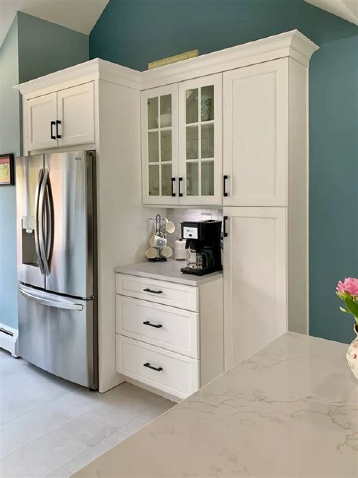 How do you cut a cabinet above a refrigerator