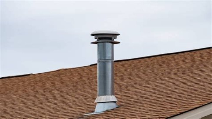 How do you install a plumbing vent on a roof