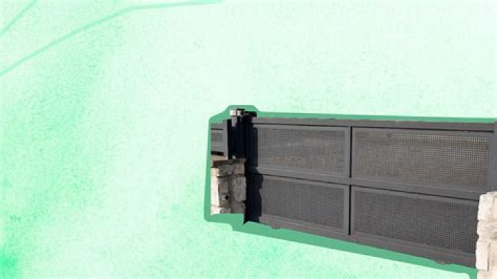 How does an electric sliding gate work