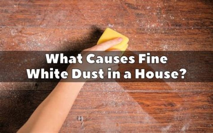 What causes white dust in a house